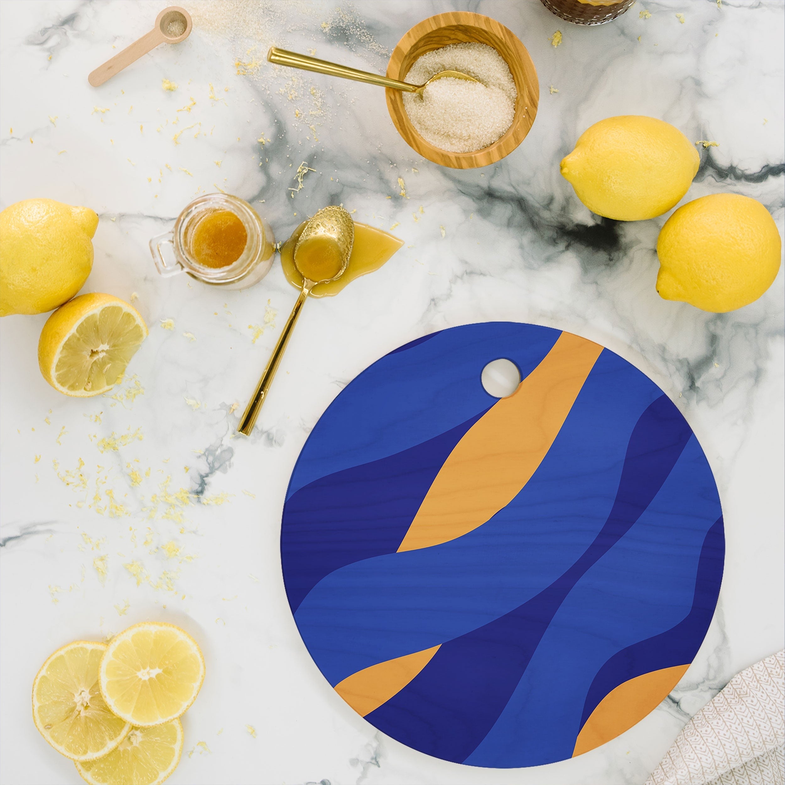 Camilla Foss Pebbles in Stream Cutting Board Round