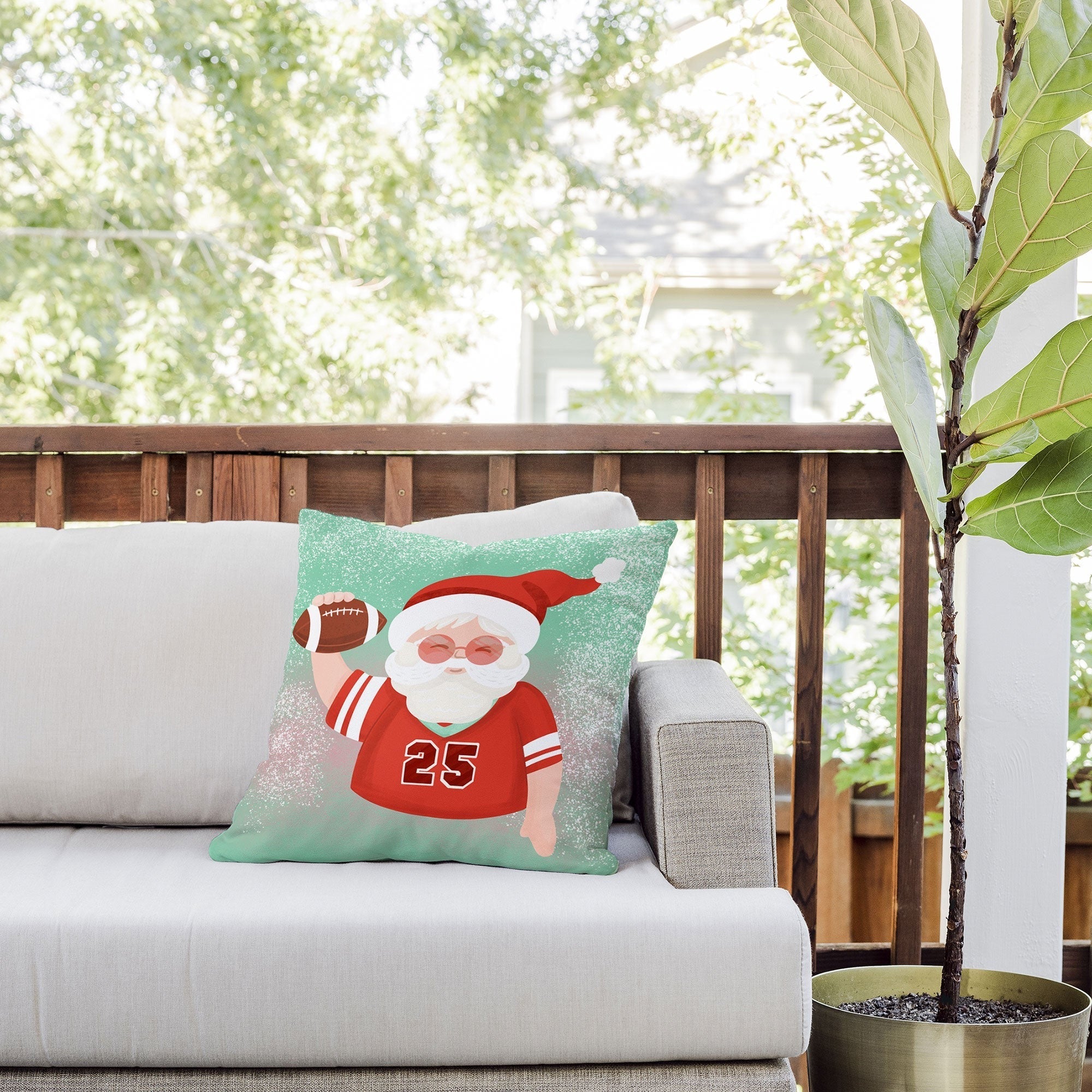 Design by Spark Sporty Football Santa Outdoor Throw Pillow