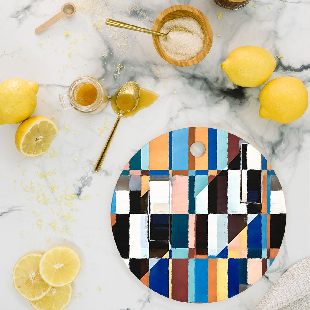 83 Oranges Scandinavian Earth Cutting Board Round