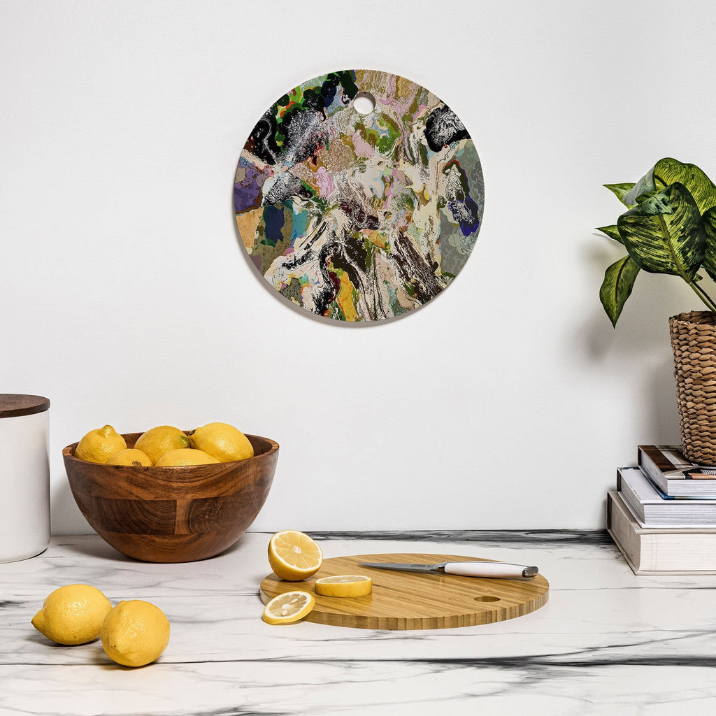 83 Oranges Echoes Beneath the Surface Cutting Board Round
