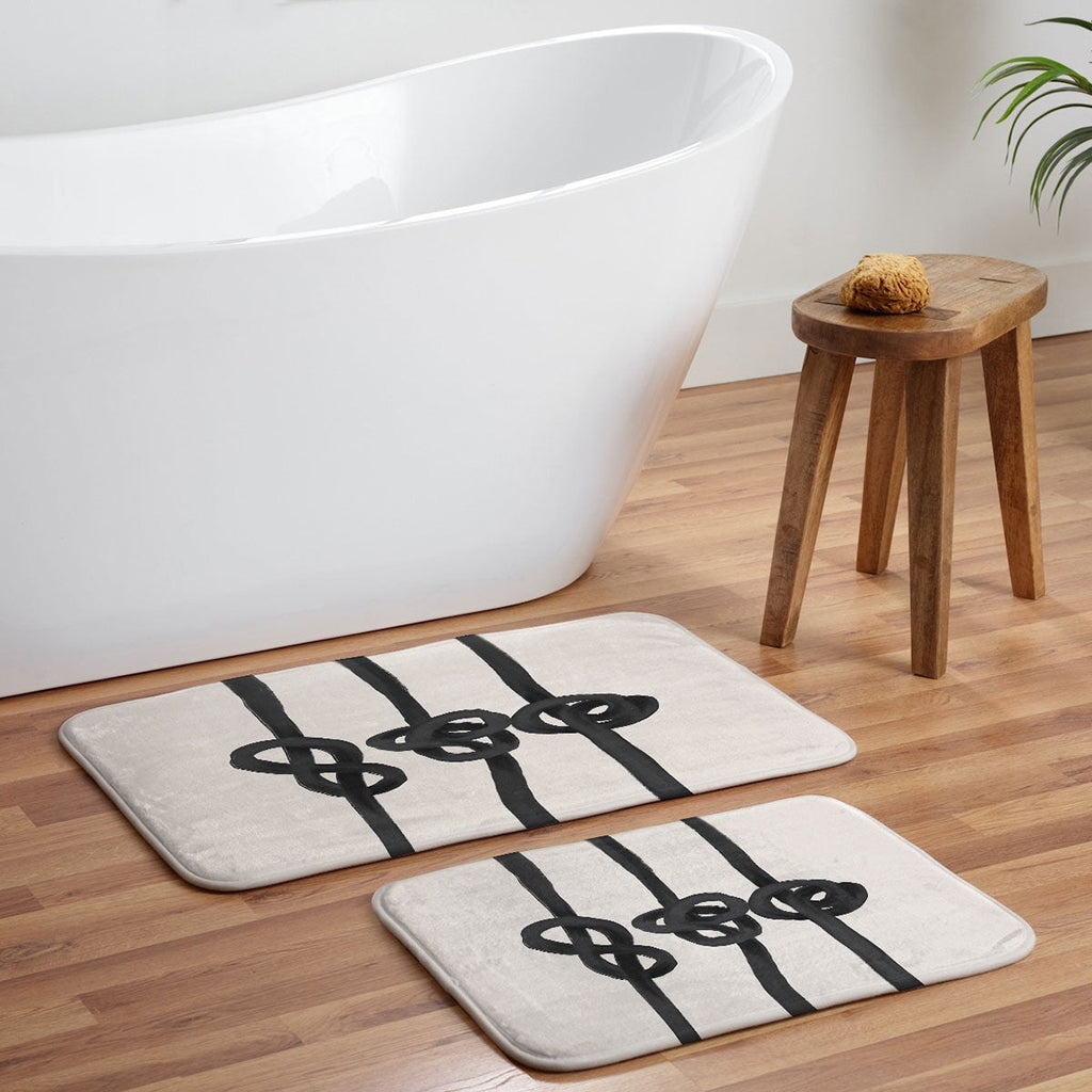 Agnes 91 Minimalist Black Knot Abstract Memory Foam Bath Mat