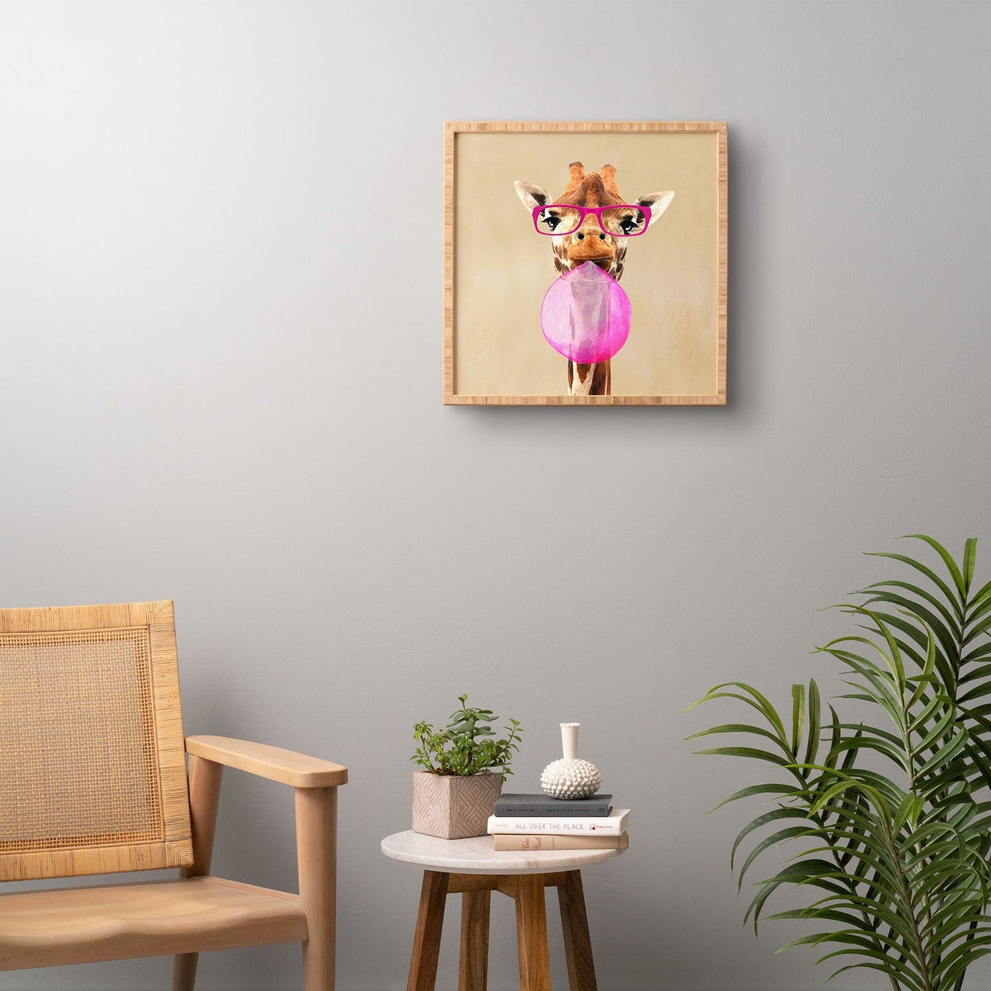 Coco de Paris Clever giraffe with bubblegum Framed Wall Art