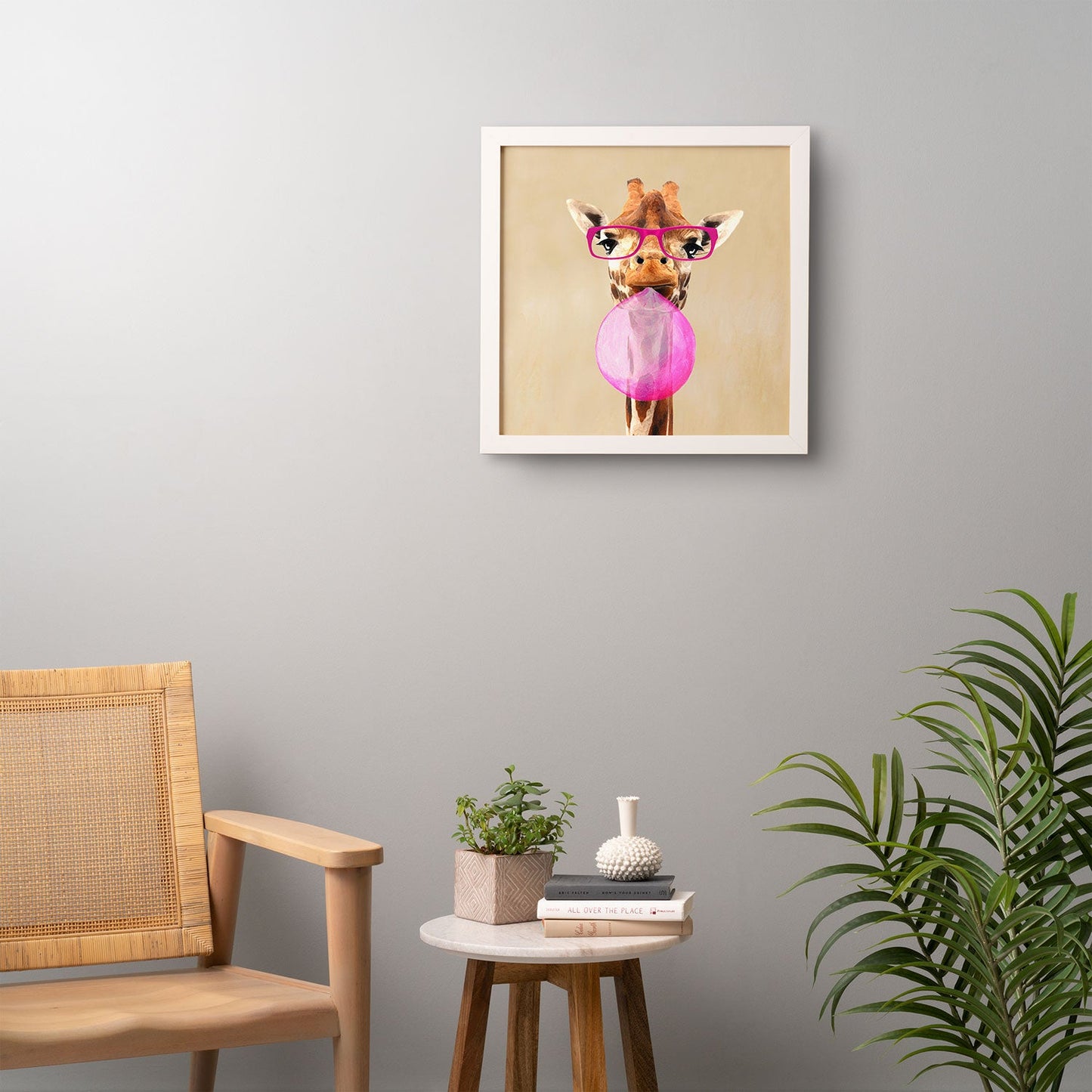 Coco de Paris Clever giraffe with bubblegum Framed Wall Art