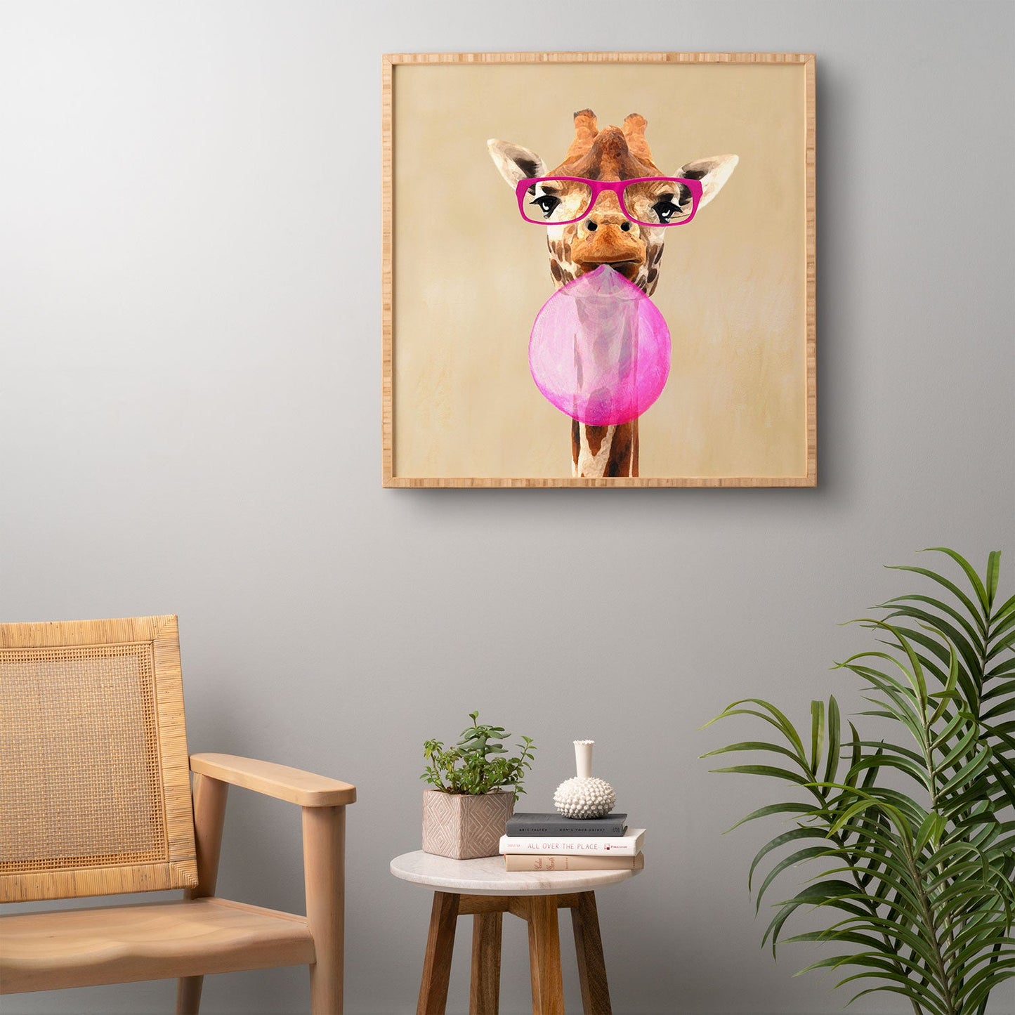 Coco de Paris Clever giraffe with bubblegum Framed Wall Art