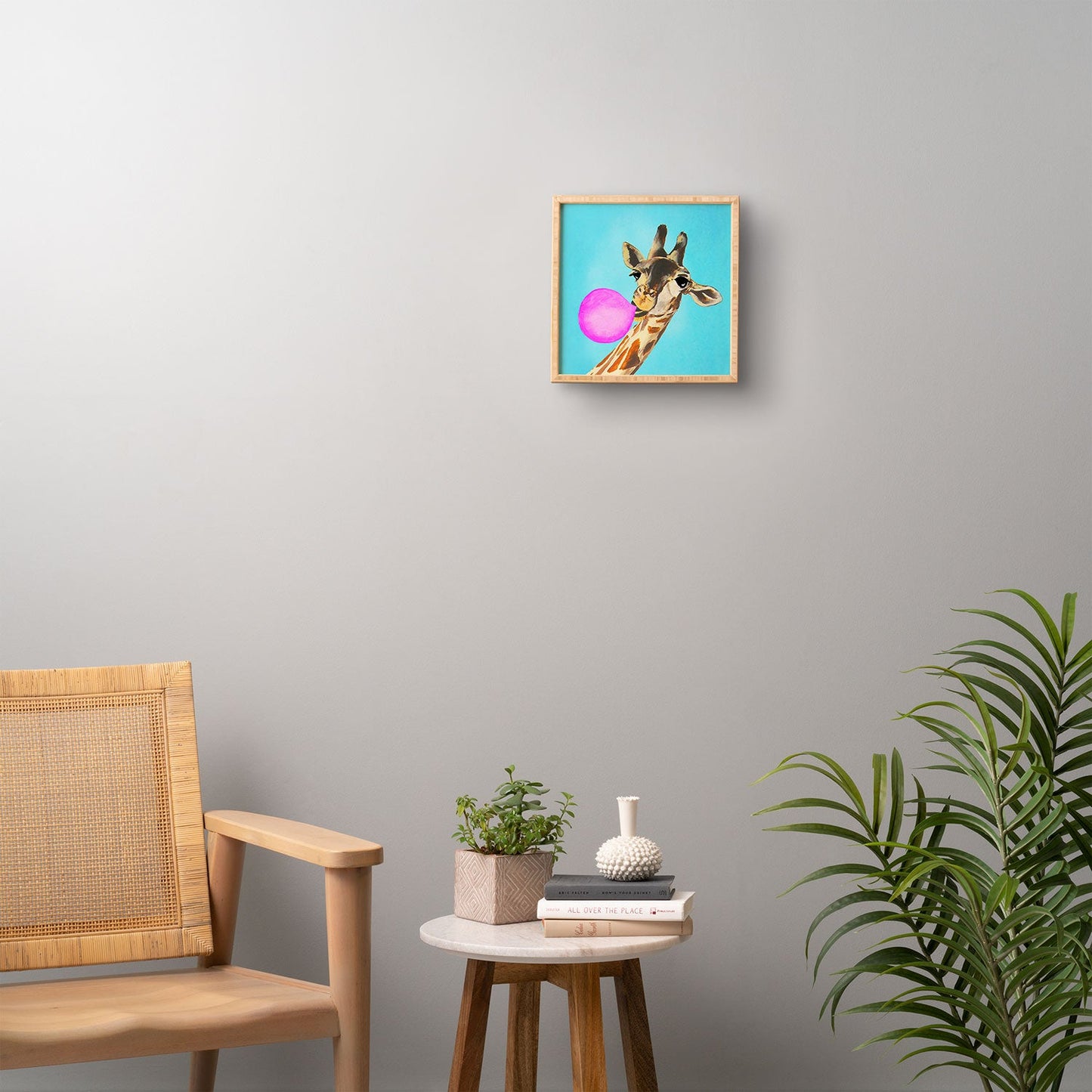 Coco de Paris Giraffe blowing bubblegum Framed Wall Art