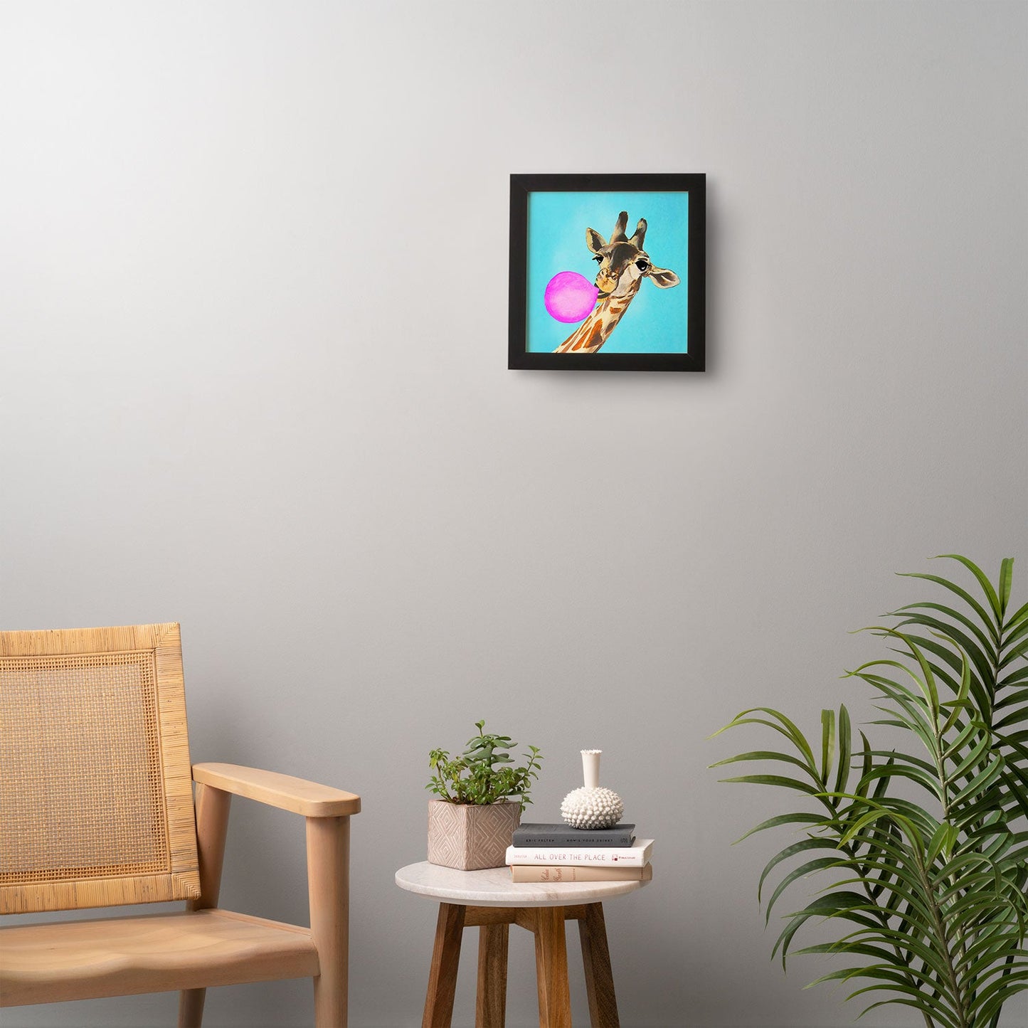 Coco de Paris Giraffe blowing bubblegum Framed Wall Art