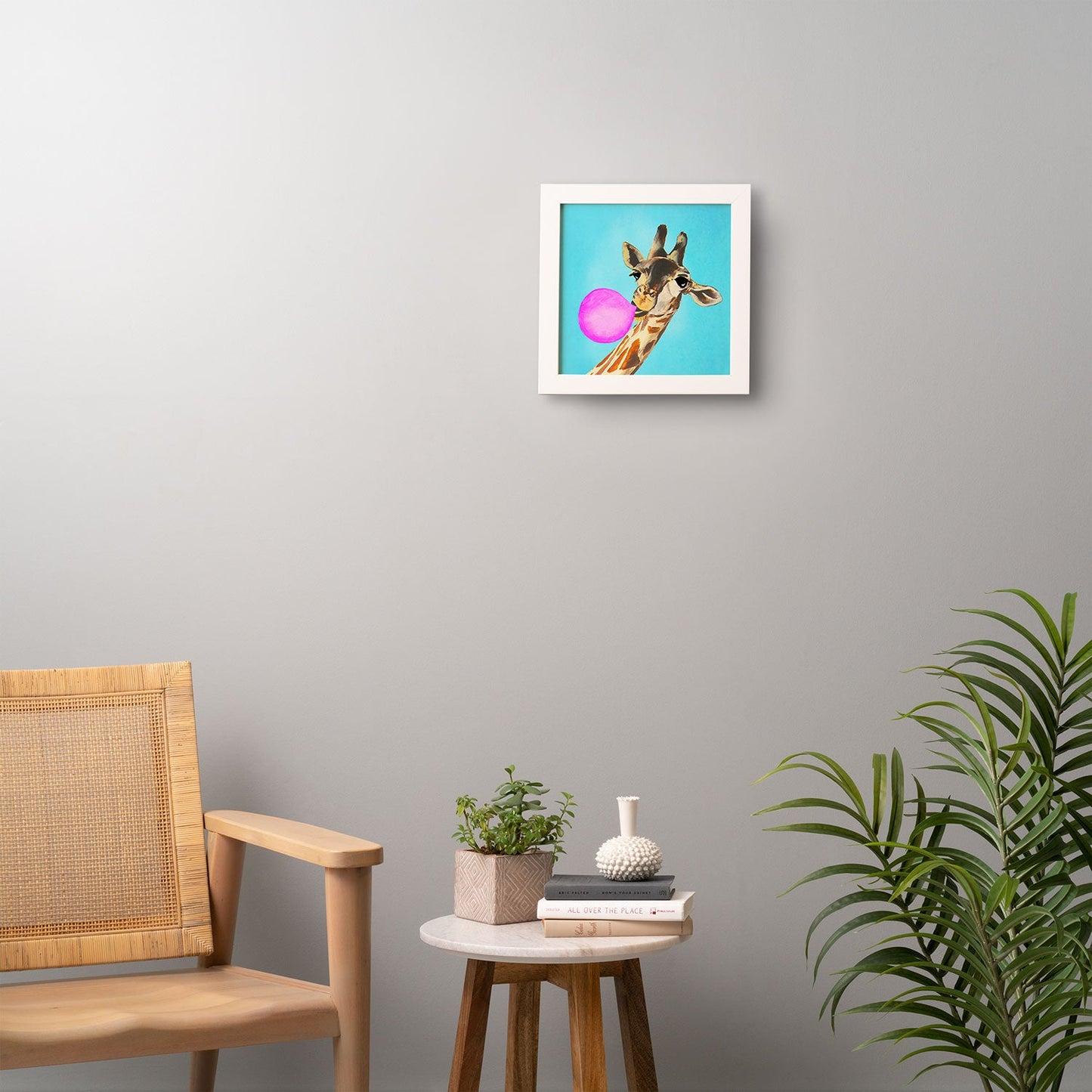 Coco de Paris Giraffe blowing bubblegum Framed Wall Art