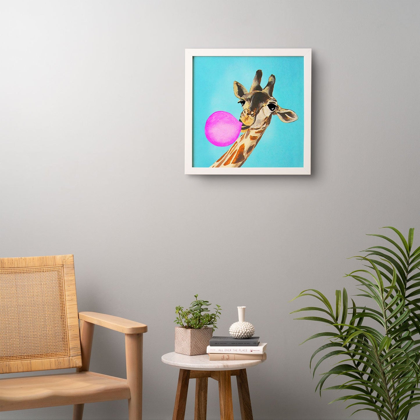 Coco de Paris Giraffe blowing bubblegum Framed Wall Art