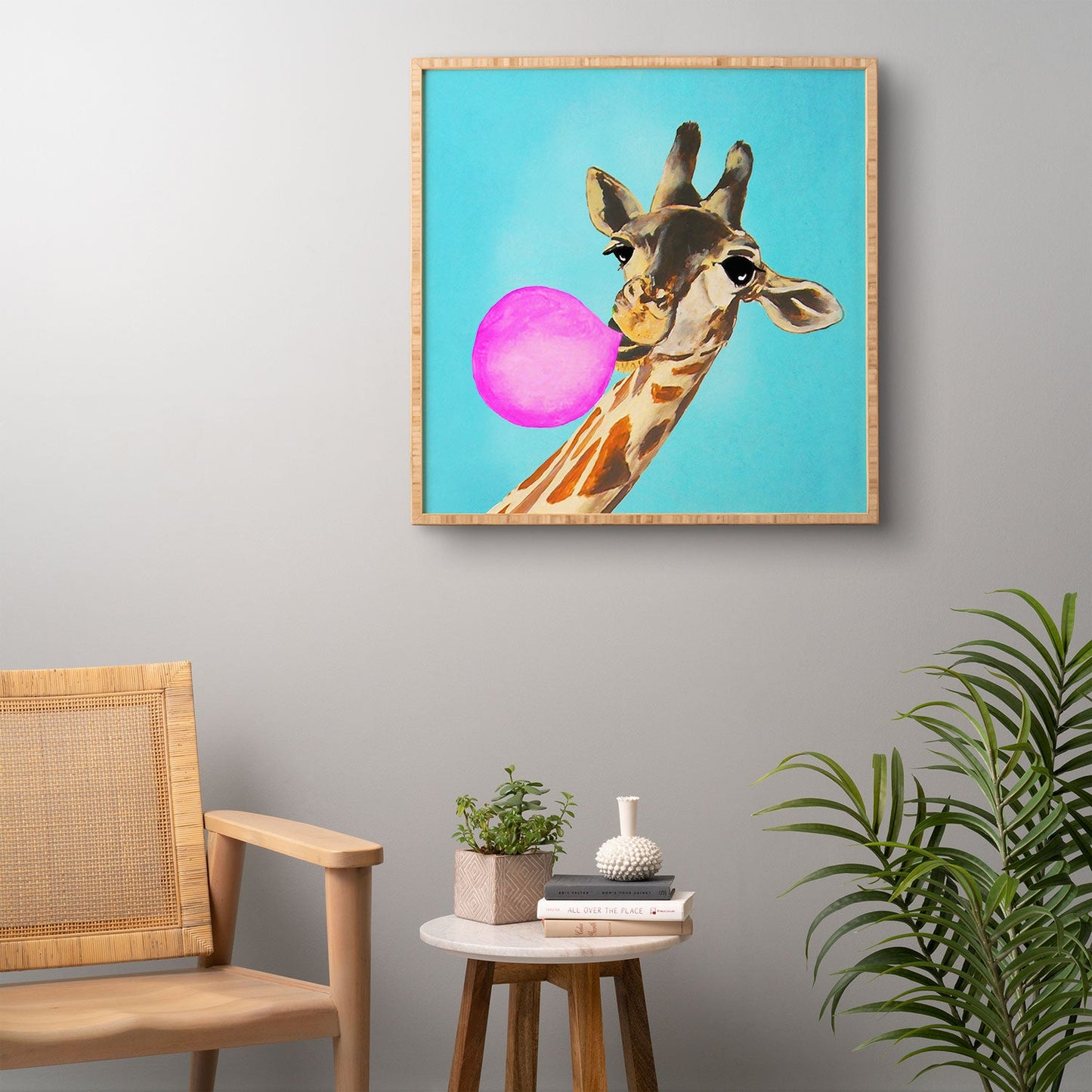 Coco de Paris Giraffe blowing bubblegum Framed Wall Art