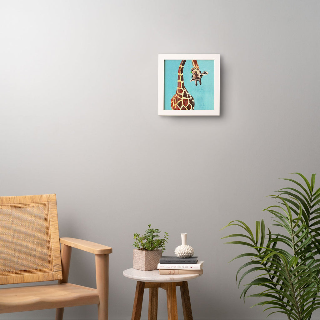Coco de Paris Giraffe with green leaf Framed Wall Art
