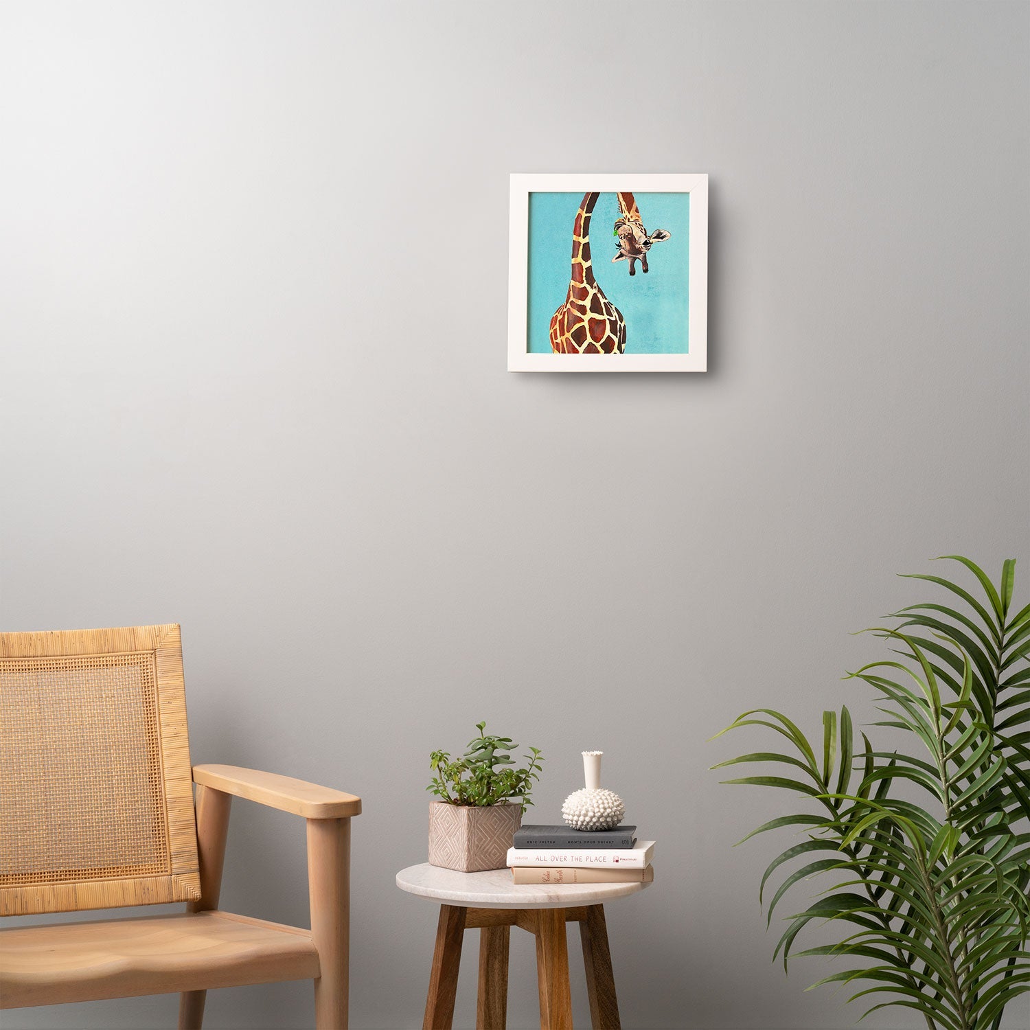 Coco de Paris Giraffe with green leaf Framed Wall Art