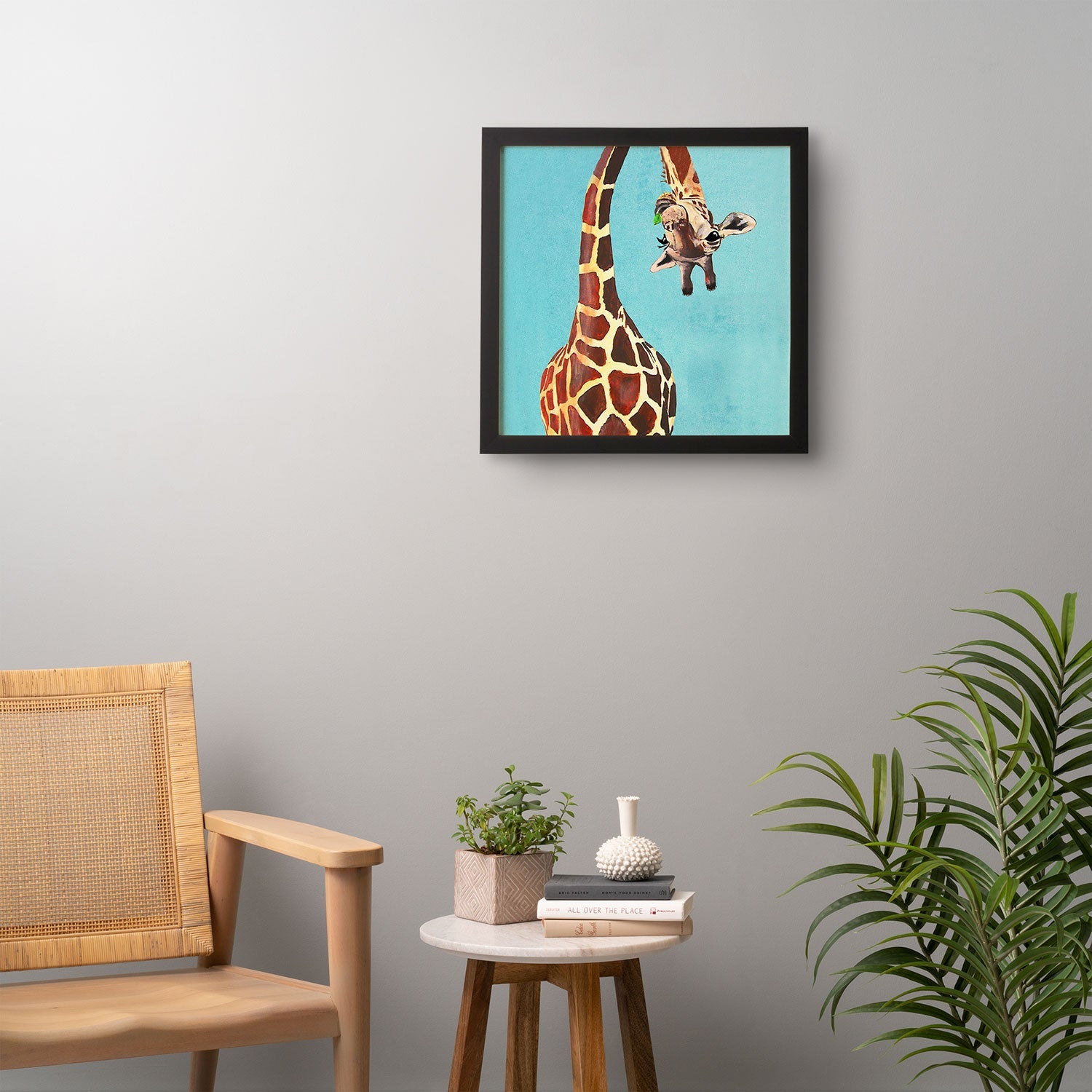 Coco de Paris Giraffe with green leaf Framed Wall Art
