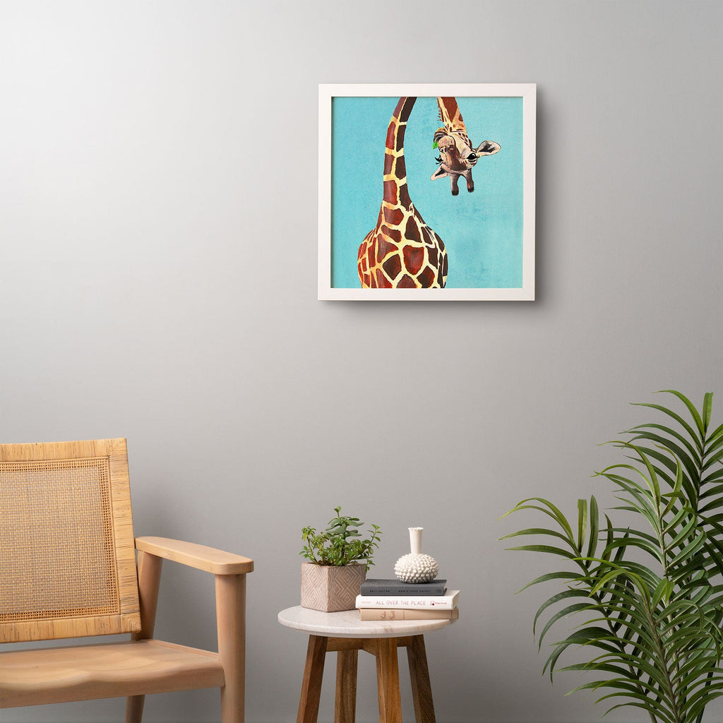 Coco de Paris Giraffe with green leaf Framed Wall Art