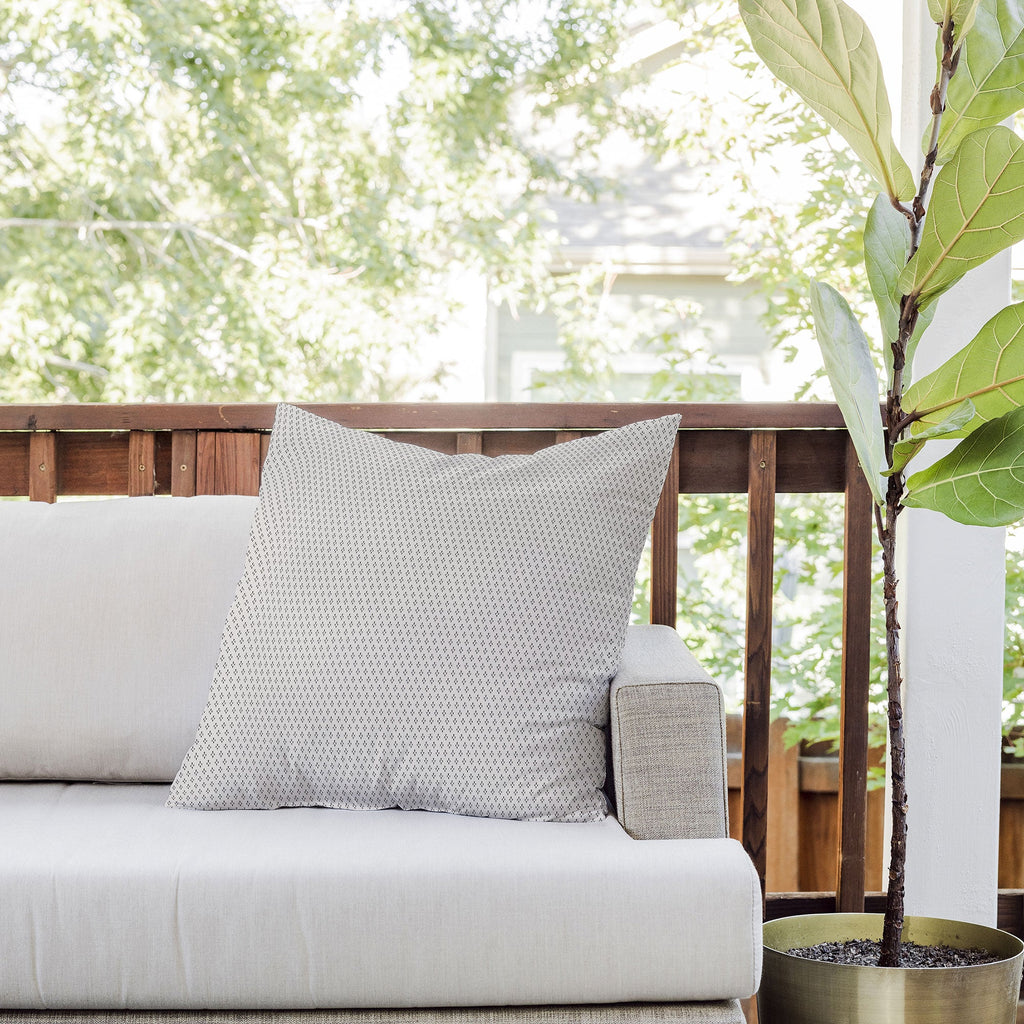 DENY Designs Block Print Dot Cream Outdoor Throw Pillow