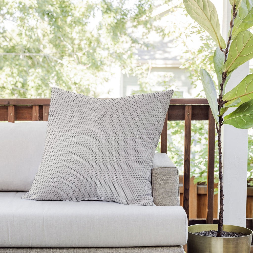 DENY Designs Block Print Dot Cream Outdoor Throw Pillow