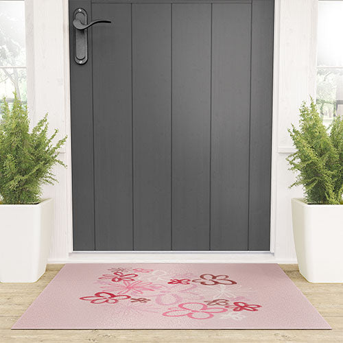 DENY Designs daisy pinks Welcome Mat