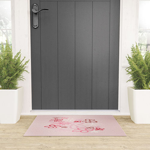 DENY Designs daisy pinks Welcome Mat