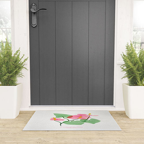 DENY Designs flamingo flower Welcome Mat