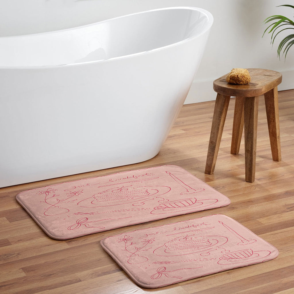 DENY Designs girl breakfast Memory Foam Bath Mat
