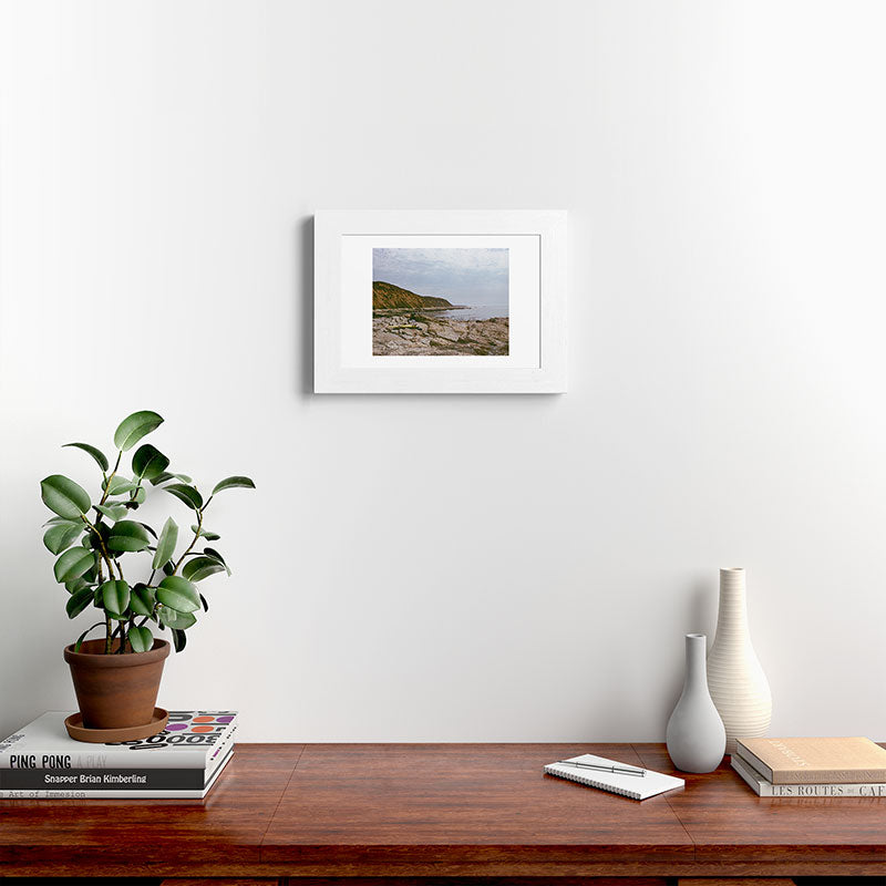 DENY Designs rocky beachside Framed Art Print
