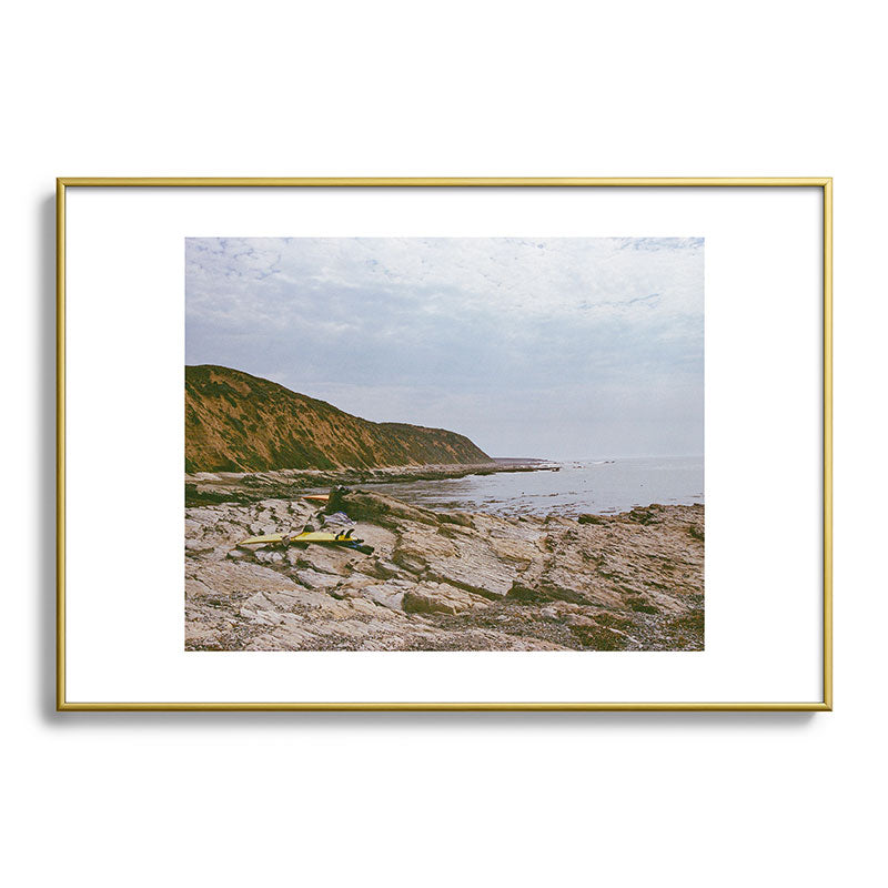 DENY Designs rocky beachside Metal Framed Art Print