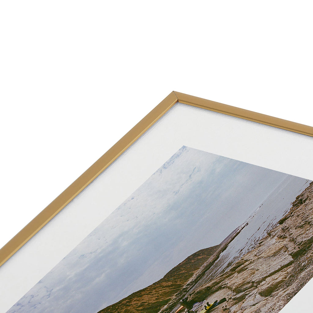 DENY Designs rocky beachside Metal Framed Art Print