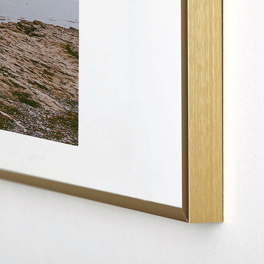 DENY Designs rocky beachside Metal Framed Art Print