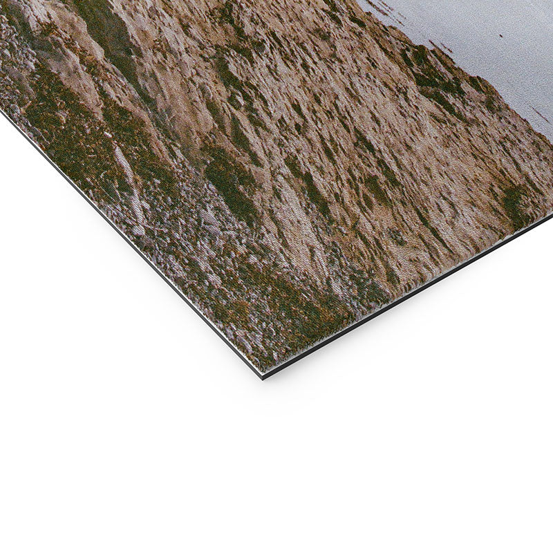 DENY Designs rocky beachside Welcome Mat