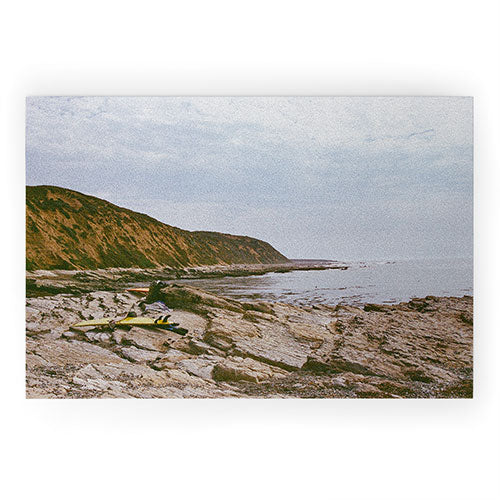 DENY Designs rocky beachside Welcome Mat