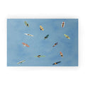 DENY Designs waiting wading surfers Welcome Mat
