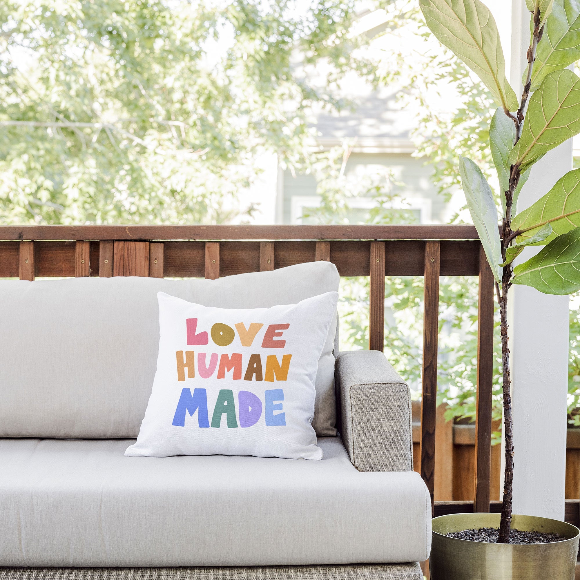Design by Spark Love Human Made Outdoor Throw Pillow