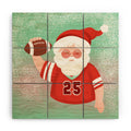 Design by Spark Sporty Football Santa Wood Wall Mural