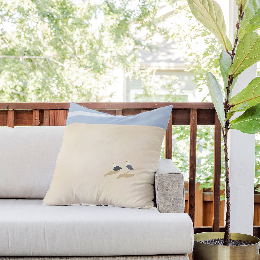 Little Dean Minimal sand beach with seagull Outdoor Throw Pillow