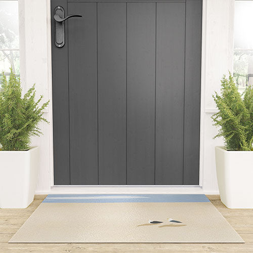 Little Dean Minimal sand beach with seagull Welcome Mat