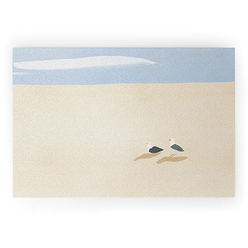 Little Dean Minimal sand beach with seagull Welcome Mat