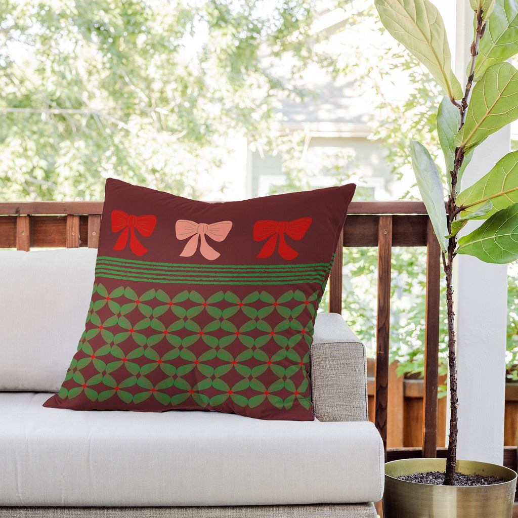 Mirimo Bows and Christmas Greens Outdoor Throw Pillow