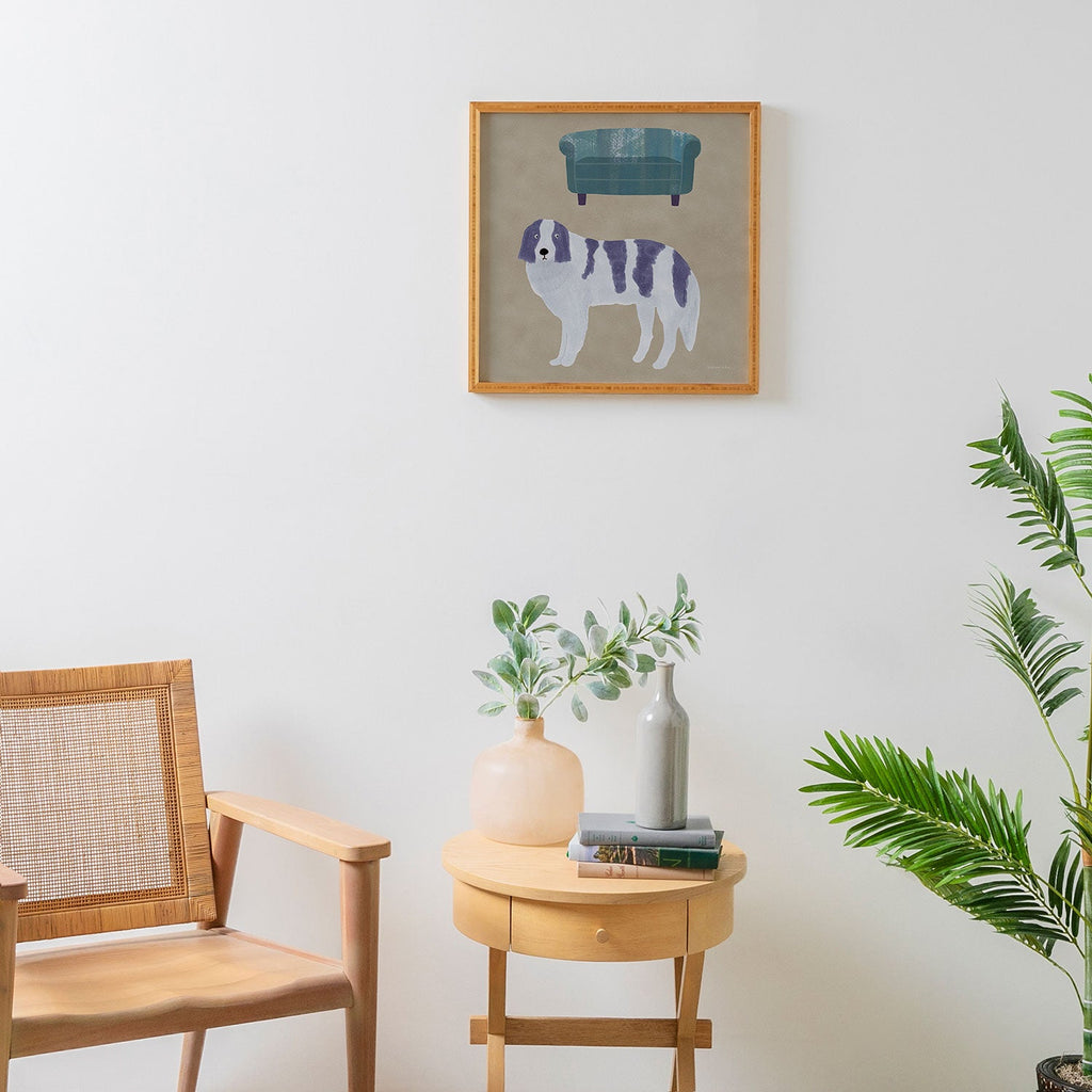 norarikka Dog and a Sofa Purple and Beige Framed Wall Art