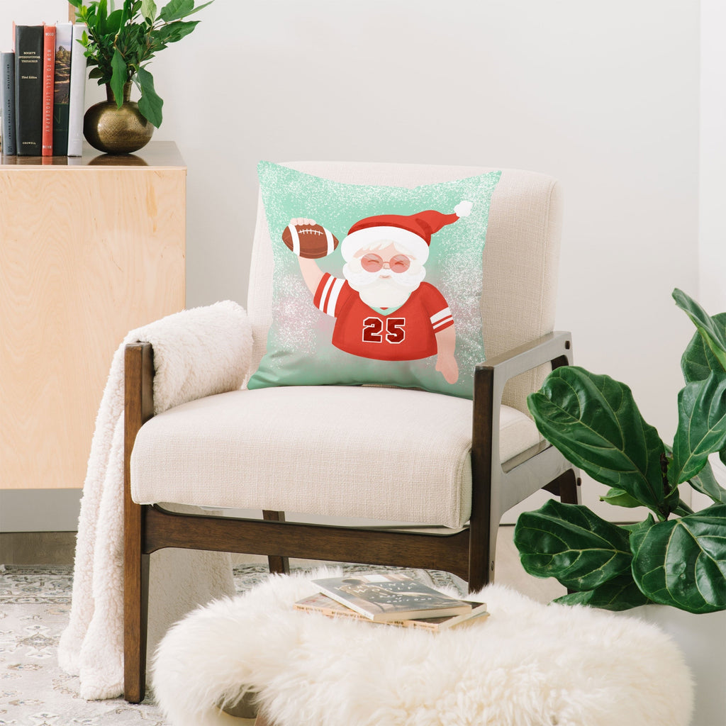 Design by Spark Sporty Football Santa Throw Pillow